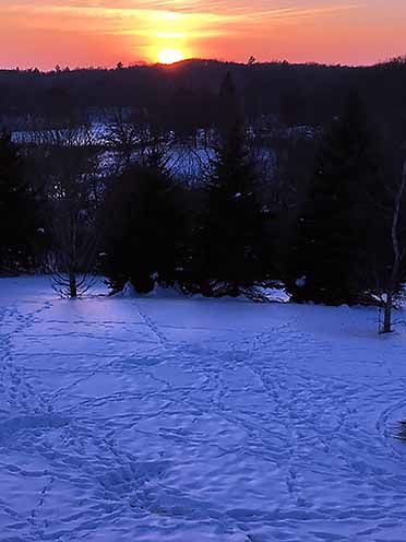 Sun over hill